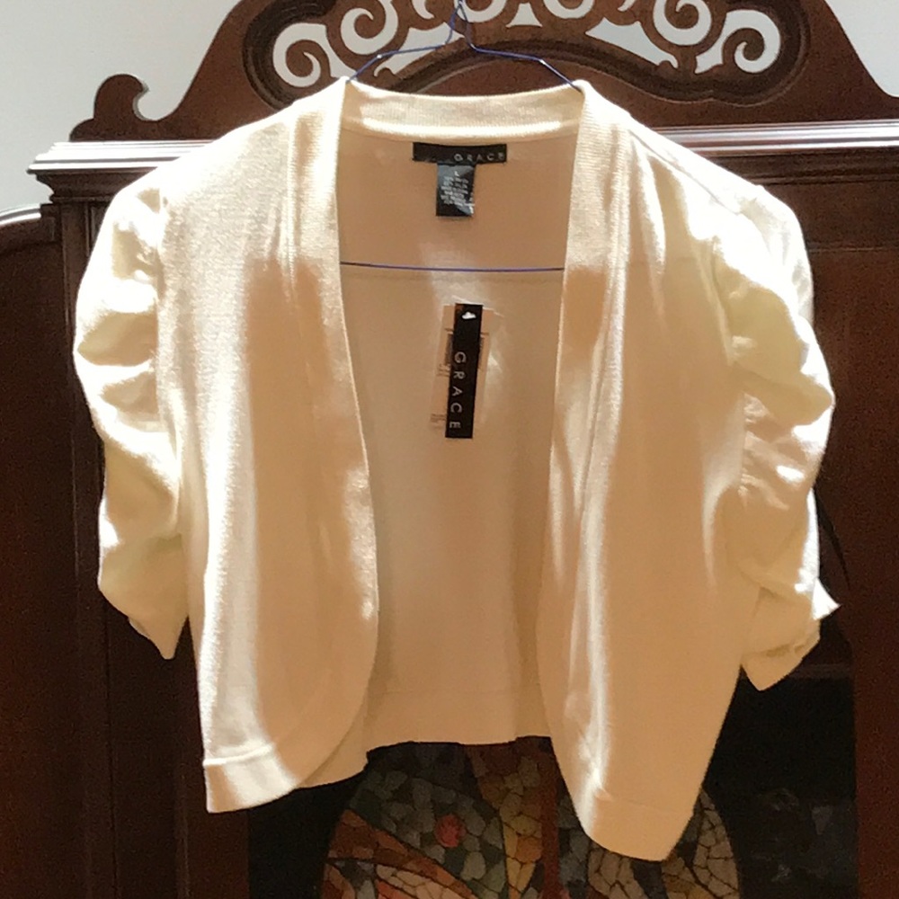 Shrug cream/white size large SOLD.